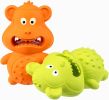 One green and one orange dog toy for aggressive chewing, dog chew toy for chewing natural rubber sounds